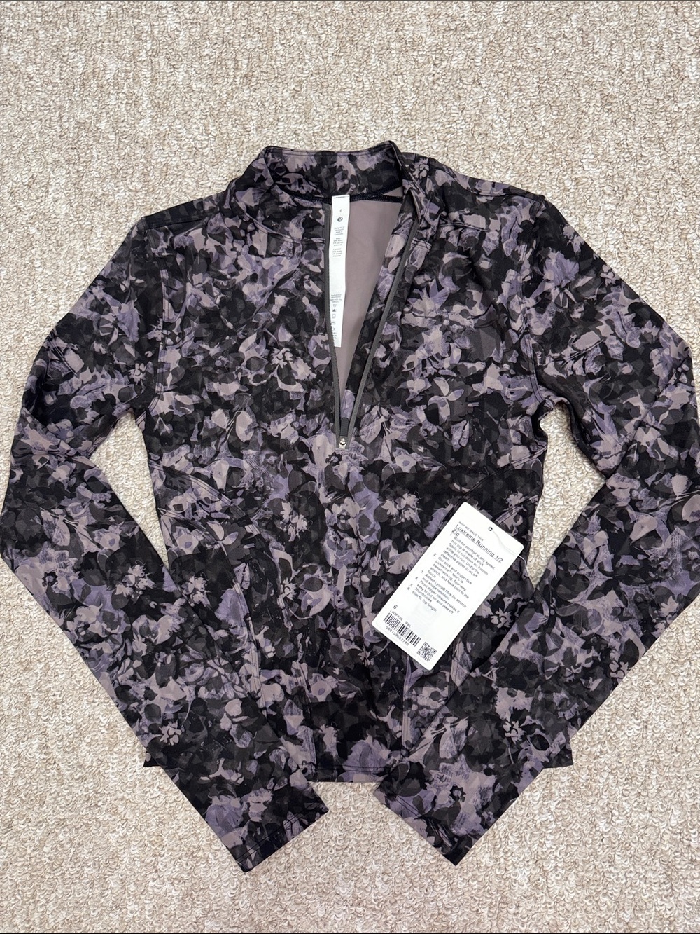 lululemon athletica Black and Lavender Floral 1/2 Zip Top